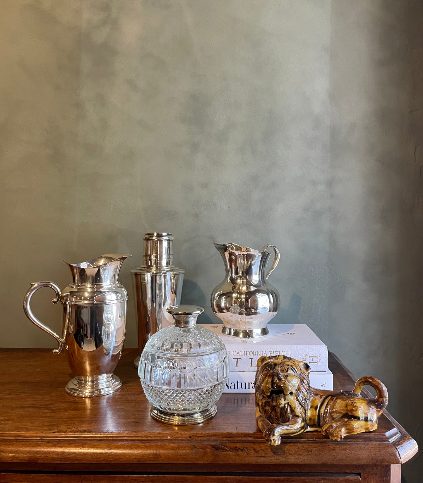 OVA NOV24 Antique silver plated Art Deco water pitcher jug with ovoid tapered body, helmet mouth, banding around the shoulder, and footed base