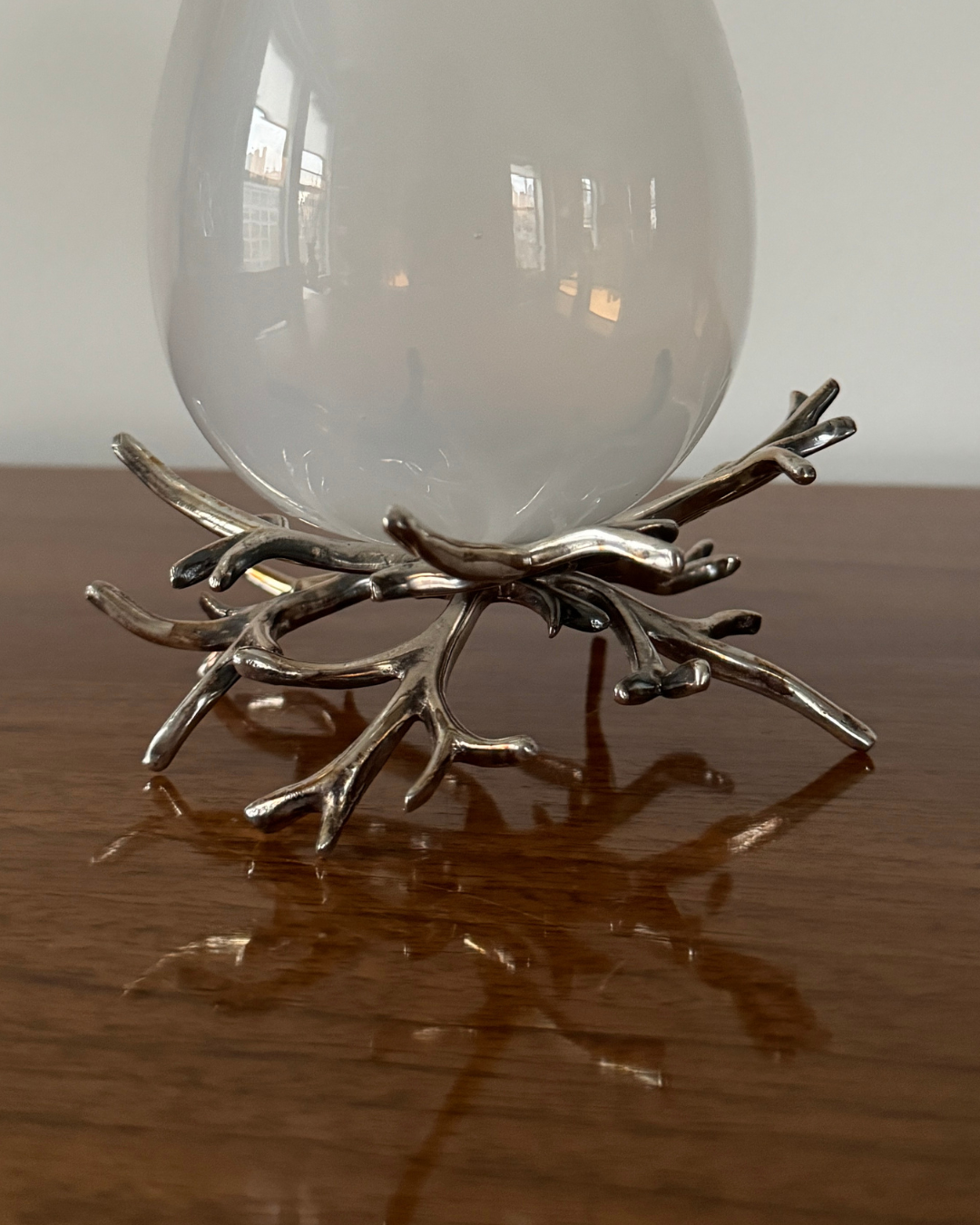 Blown Glass Egg With Rhodium Finish Plated Metal "Nest" Base