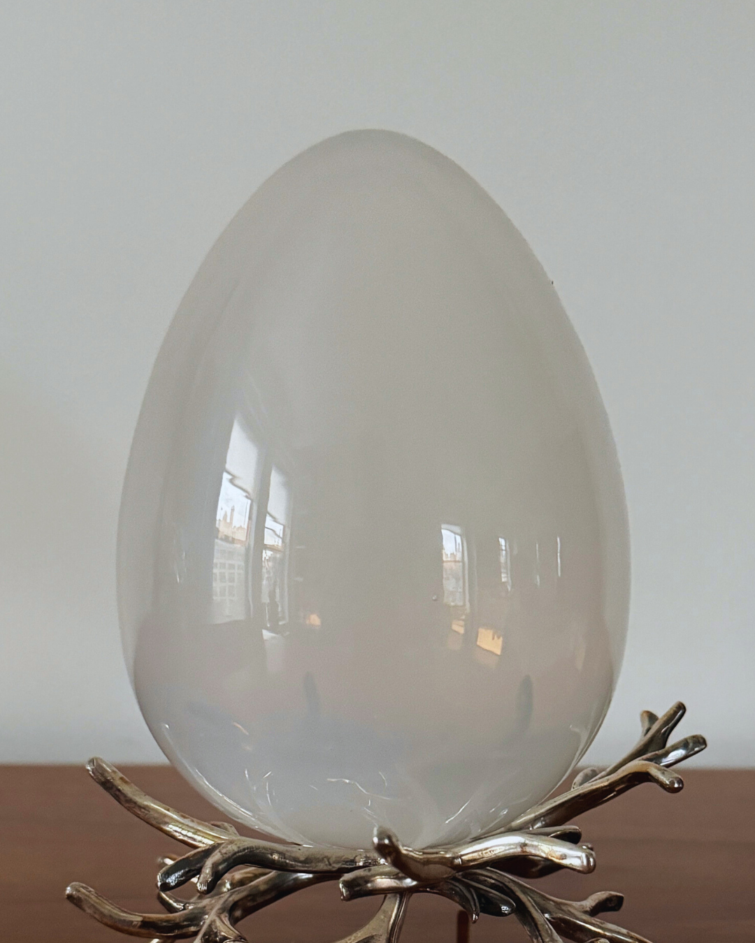 Blown Glass Egg With Rhodium Finish Plated Metal "Nest" Base