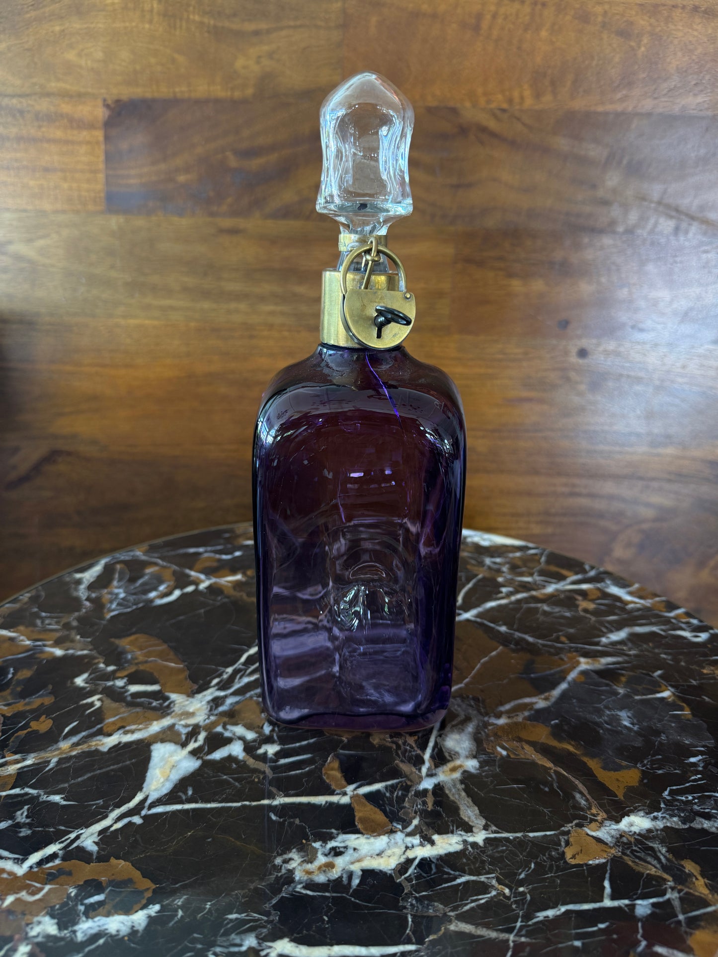 Rare vintage Austrian amethyst-glass decanter with brass padlock detail