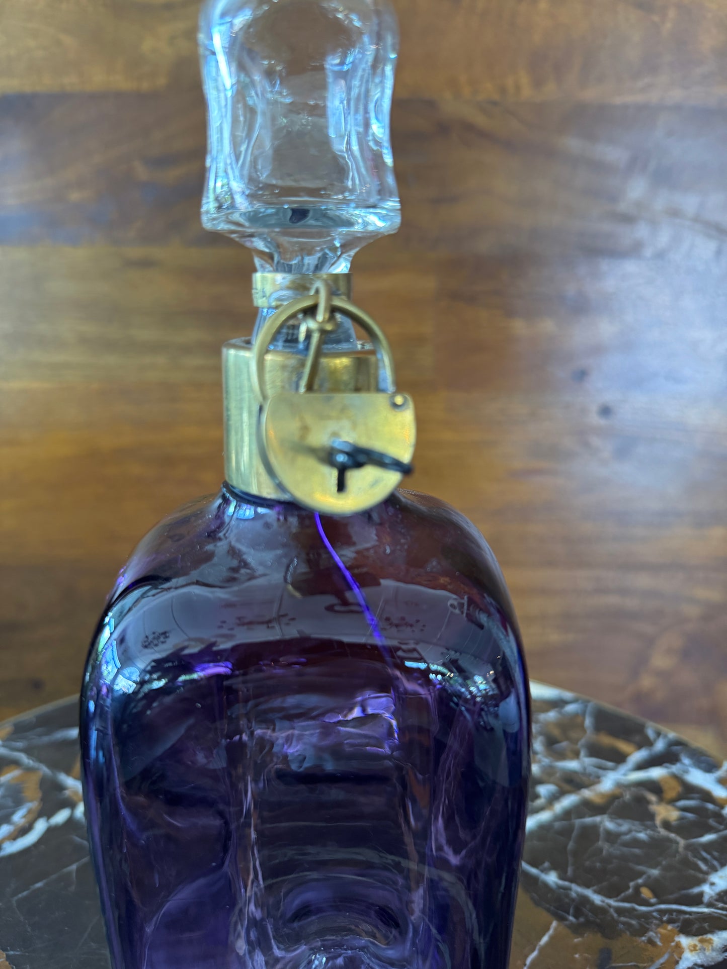 Rare vintage Austrian amethyst-glass decanter with brass padlock detail