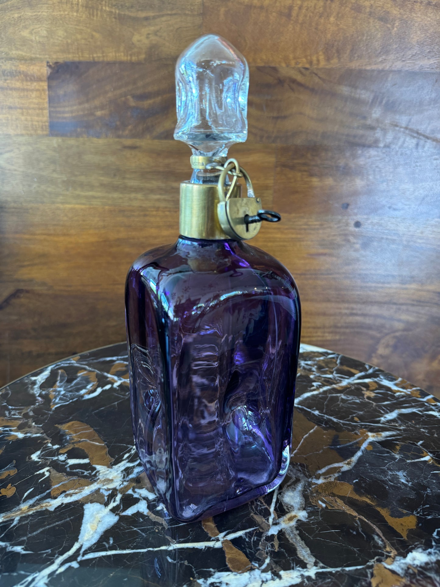 Rare vintage Austrian amethyst-glass decanter with brass padlock detail