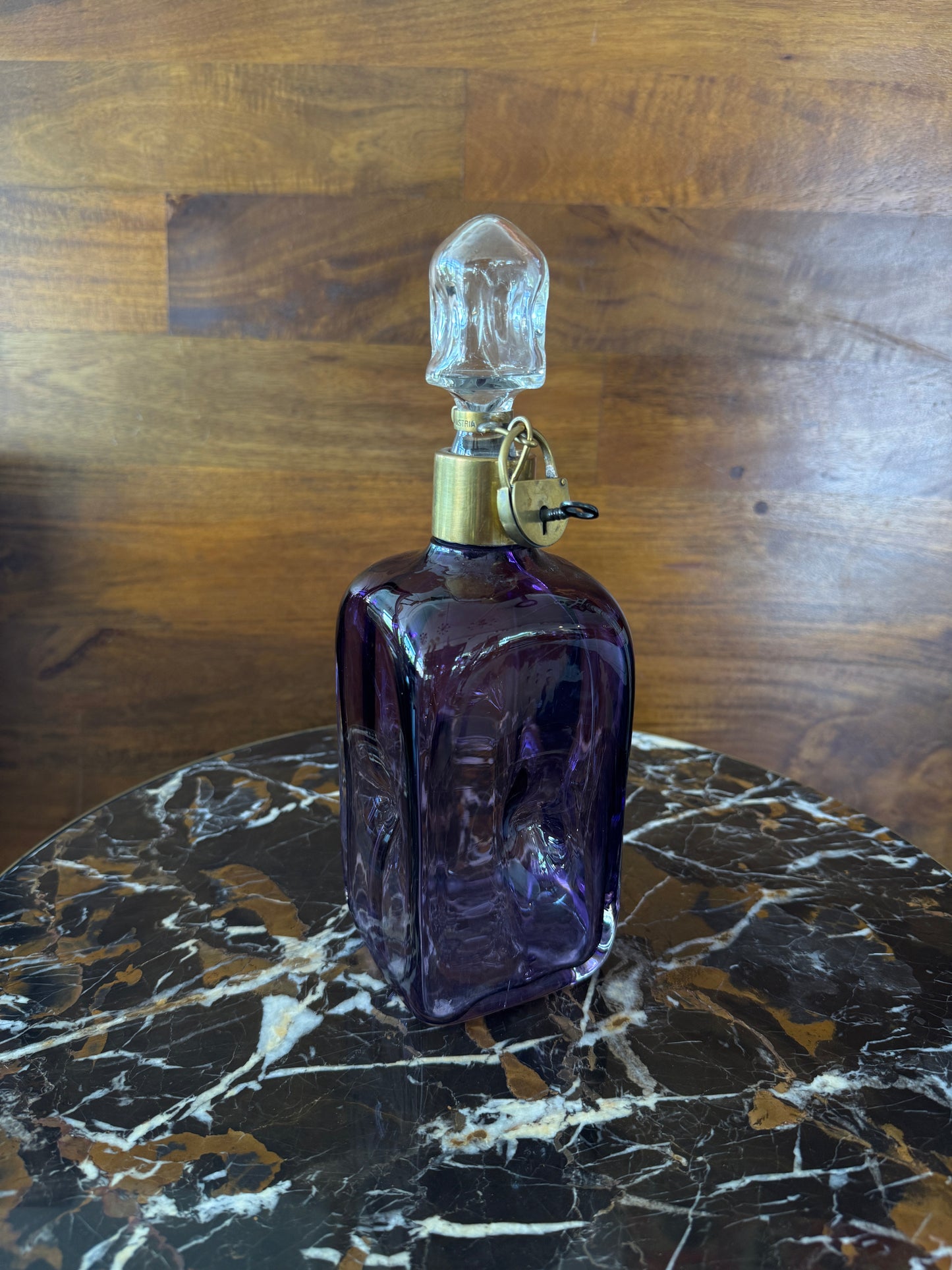 Rare vintage Austrian amethyst-glass decanter with brass padlock detail