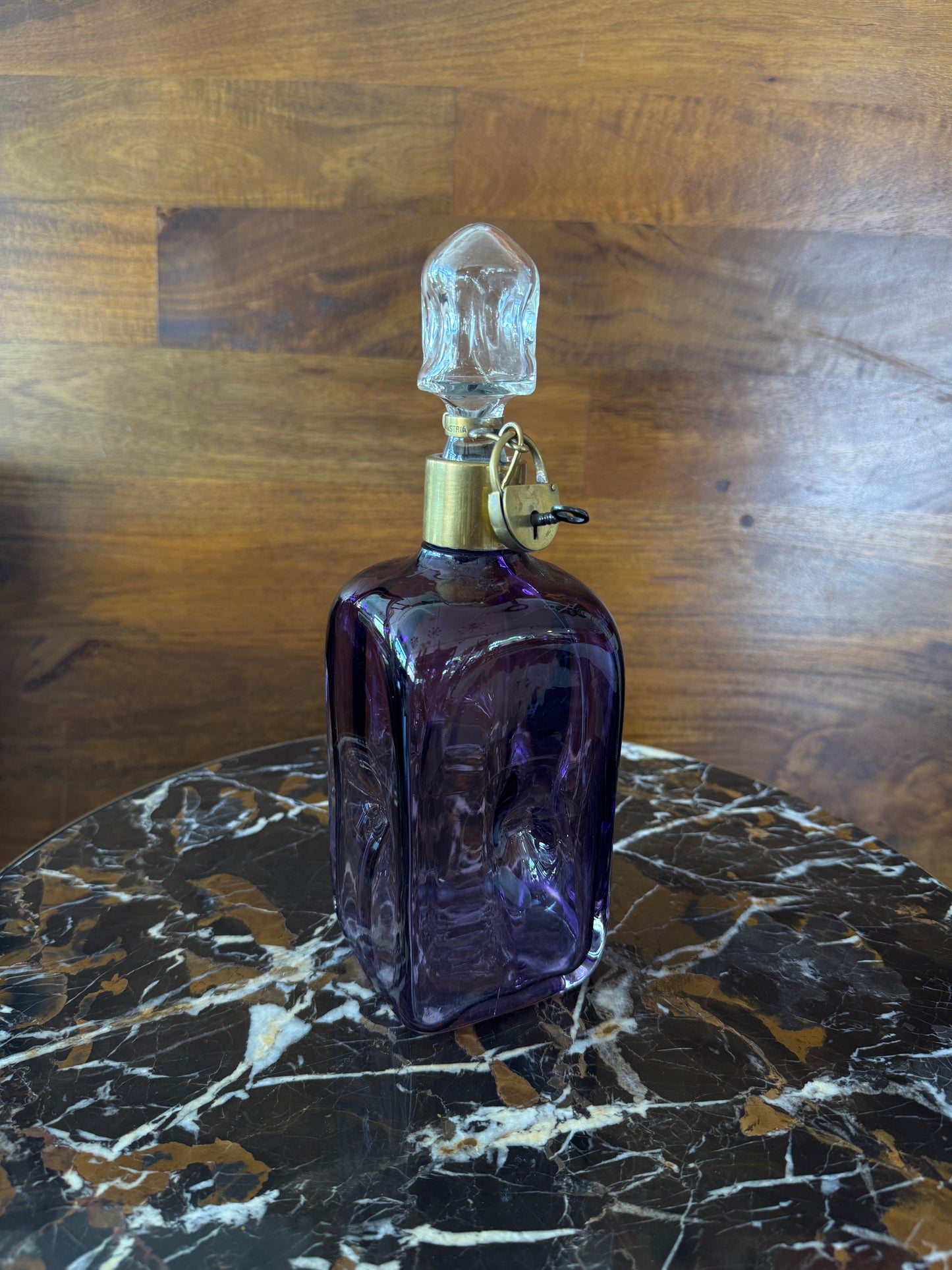 Rare vintage Austrian amethyst-glass decanter with brass padlock detail