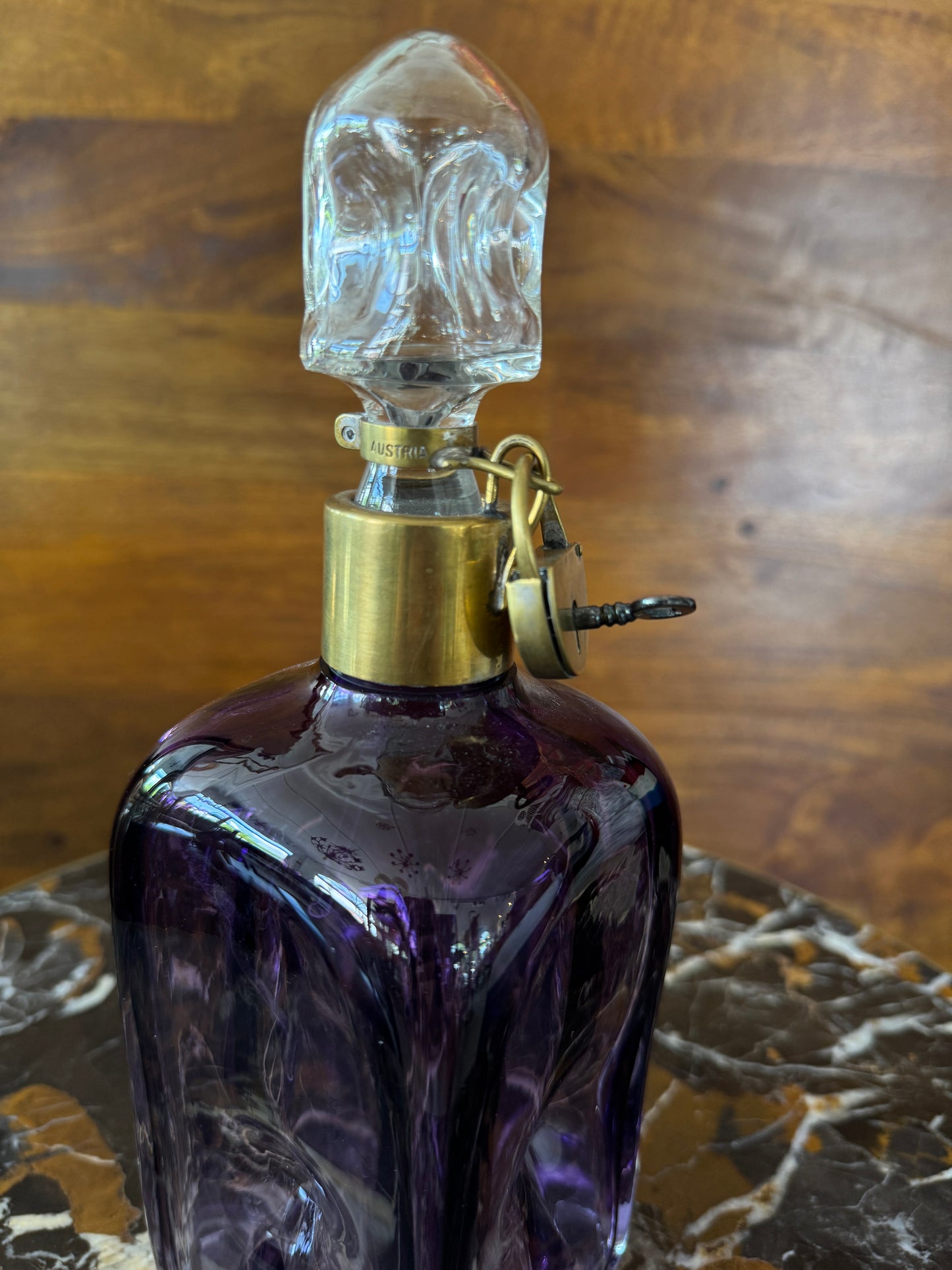 Rare vintage Austrian amethyst-glass decanter with brass padlock detail