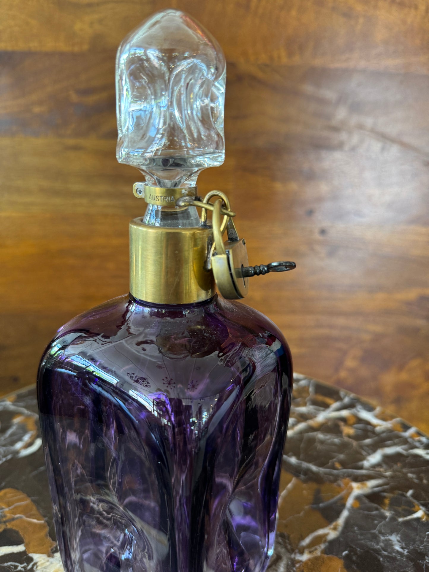 Rare vintage Austrian amethyst-glass decanter with brass padlock detail