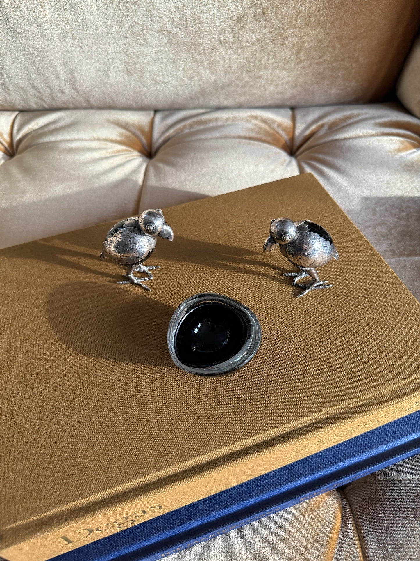 Pair of mid century Sterling silver and onyx birds