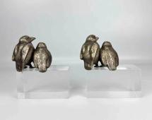 ART DECO SILVERED BIRD BOOKENDS, MANNER OF SANDOZ